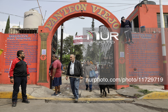 The entrance to the old pantheon of Santiago Zapotitlan in Mexico City, Mexico, on November 1, 2024, where inhabitants decorate the graves o...