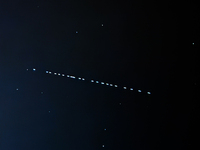 Starlink satellites passage is seen on the sky in southern Poland on November 1, 2024. (