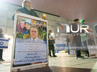 Dozens of Iranian activists participate in protests over the execution of German-Iranian citizen Jamshid Sharmahd in Cologne, Germany, on No...