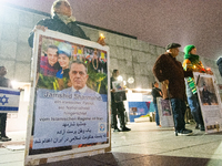 Dozens of Iranian activists participate in protests over the execution of German-Iranian citizen Jamshid Sharmahd in Cologne, Germany, on No...