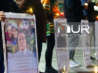 Dozens of Iranian activists participate in protests over the execution of German-Iranian citizen Jamshid Sharmahd in Cologne, Germany, on No...