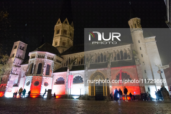 Bonner Munster, the old Catholic church, is illuminated during the ''Bonn Leuchtet'' light festival in Bonn, Germany, on November 1, 2024. 