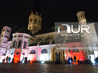 Bonner Munster, the old Catholic church, is illuminated during the ''Bonn Leuchtet'' light festival in Bonn, Germany, on November 1, 2024. (