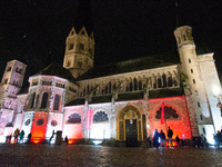 Bonner Munster, the old Catholic church, is illuminated during the ''Bonn Leuchtet'' light festival in Bonn, Germany, on November 1, 2024. (