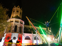 Bonner Munster, the old Catholic church, is illuminated during the ''Bonn Leuchtet'' light festival in Bonn, Germany, on November 1, 2024. (