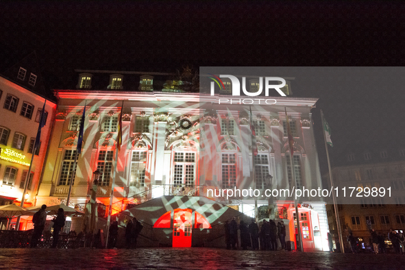 The town hall of Bonn is illuminated during the ''Bonn Leuchtet'' light festival in Bonn, Germany, on November 1, 2024. 