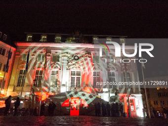 The town hall of Bonn is illuminated during the ''Bonn Leuchtet'' light festival in Bonn, Germany, on November 1, 2024. (