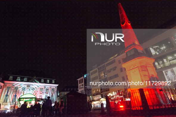 The town hall of Bonn is illuminated during the ''Bonn Leuchtet'' light festival in Bonn, Germany, on November 1, 2024. 