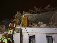 Rescuers work at a house destroyed by a Russian missile strike in Kharkiv, Ukraine, on November 1, 2024. NO USE RUSSIA. NO USE BELARUS. (