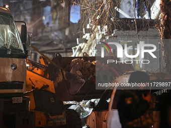 A bucket loader is used to remove the rubble after a Russian missile strike in Kharkiv, Ukraine, on November 1, 2024. NO USE RUSSIA. NO USE...