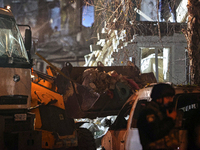 A bucket loader is used to remove the rubble after a Russian missile strike in Kharkiv, Ukraine, on November 1, 2024. NO USE RUSSIA. NO USE...