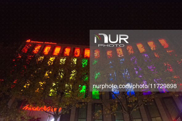 The Sparkasse KoelnBonn bank building is illuminated during the ''Bonn Leuchtet'' light festival in Bonn, Germany, on November 1, 2024. 