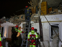 Rescuers work at a house destroyed by a Russian missile strike in Kharkiv, Ukraine, on November 1, 2024. NO USE RUSSIA. NO USE BELARUS. (