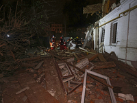 Rescuers work at a house destroyed by a Russian missile strike in Kharkiv, Ukraine, on November 1, 2024. NO USE RUSSIA. NO USE BELARUS. (