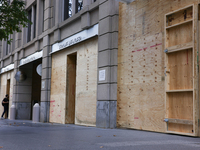 Storefronts are seen covered near the White House in Washington, D.C. on November 1, 2024 in preparation for possible civil unrest related t...