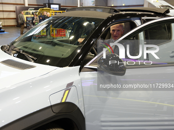 Jean-Dominique Senard, Chairman of the Board of Renault, sits in the new electric innovative car Renault 4 at the Paris Motor Show at Paris...