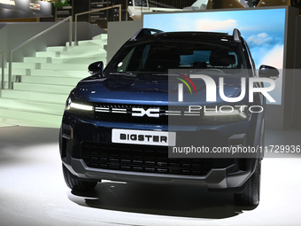 The new hybrid SUV BIGSTER is at the Dacia stand at the Paris Motor Show in Paris, France, on October 14, 2024, at Paris Expo Porte de Versa...