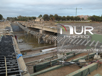 A view of the disaster area as search and rescue operations and aid delivery continue in Paiporta following the floods caused by heavy rain...