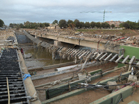 A view of the disaster area as search and rescue operations and aid delivery continue in Paiporta following the floods caused by heavy rain...