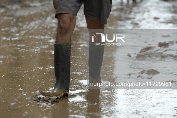 A view of the disaster area as search and rescue operations and aid delivery continue in Paiporta following the floods caused by heavy rain...