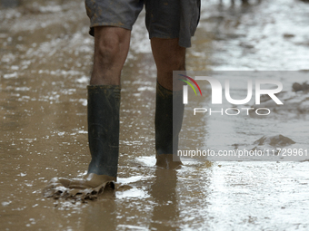 A view of the disaster area as search and rescue operations and aid delivery continue in Paiporta following the floods caused by heavy rain...