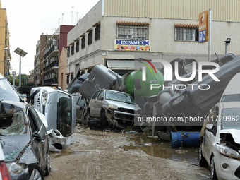 A view of the disaster area as search and rescue operations and aid delivery continue in Paiporta following the floods caused by heavy rain...