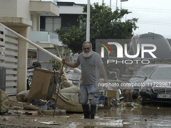 A view of the disaster area as search and rescue operations and aid delivery continue in Paiporta following the floods caused by heavy rain...