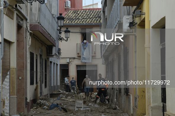 A view of the disaster area as search and rescue operations and aid delivery continue in Paiporta following the floods caused by heavy rain...