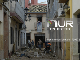 A view of the disaster area as search and rescue operations and aid delivery continue in Paiporta following the floods caused by heavy rain...