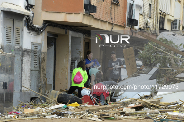 A view of the disaster area as search and rescue operations and aid delivery continue in Paiporta following the floods caused by heavy rain...