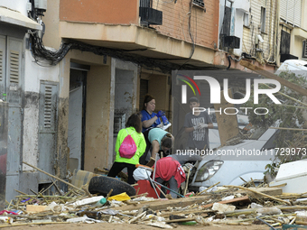 A view of the disaster area as search and rescue operations and aid delivery continue in Paiporta following the floods caused by heavy rain...