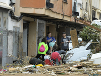 A view of the disaster area as search and rescue operations and aid delivery continue in Paiporta following the floods caused by heavy rain...