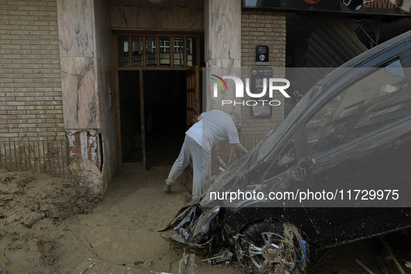 A view of the disaster area as search and rescue operations and aid delivery continue in Paiporta following the floods caused by heavy rain...