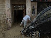 A view of the disaster area as search and rescue operations and aid delivery continue in Paiporta following the floods caused by heavy rain...