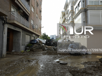 A view of the disaster area as search and rescue operations and aid delivery continue in Paiporta following the floods caused by heavy rain...