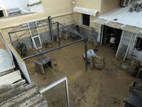 A view of the disaster area as search and rescue operations and aid delivery continue in Paiporta following the floods caused by heavy rain...