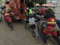 A view of the disaster area as search and rescue operations and aid delivery continue in Paiporta following the floods caused by heavy rain...