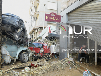 A view of the disaster area as search and rescue operations and aid delivery continue in Paiporta following the floods caused by heavy rain...