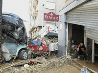 A view of the disaster area as search and rescue operations and aid delivery continue in Paiporta following the floods caused by heavy rain...