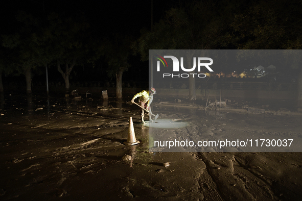 Emergency personnel work in a flooded area after heavy rains cause flooding in Uriel, Valencia, Spain, on November 1, 2024. 