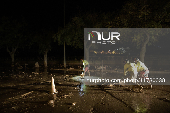 Emergency personnel work in a flooded area after heavy rains cause flooding in Uriel, Valencia, Spain, on November 1, 2024. 