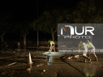 Emergency personnel work in a flooded area after heavy rains cause flooding in Uriel, Valencia, Spain, on November 1, 2024. (