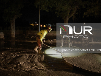 Emergency personnel work in a flooded area after heavy rains cause flooding in Uriel, Valencia, Spain, on November 1, 2024. (