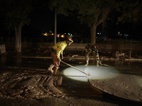 Emergency personnel work in a flooded area after heavy rains cause flooding in Uriel, Valencia, Spain, on November 1, 2024. (