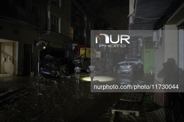 Emergency personnel work in a flooded area after heavy rains cause flooding in Uriel, Valencia, Spain, on November 1, 2024. 