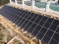 An aerial photo on November 1, 2024, shows the Qiuli photovoltaic distributed power station in Xijiang town, Congjiang county, Guizhou provi...