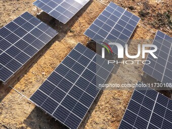 An aerial photo on November 1, 2024, shows the Qiuli photovoltaic distributed power station in Xijiang town, Congjiang county, Guizhou provi...