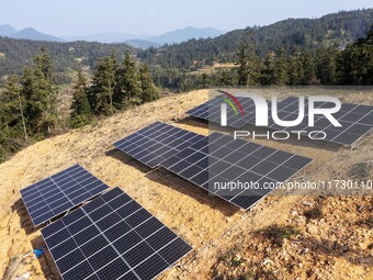 An aerial photo on November 1, 2024, shows the Qiuli photovoltaic distributed power station in Xijiang town, Congjiang county, Guizhou provi...