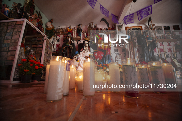 An image of Santa Muerte is seen inside the temple in the municipality of Pedro Escobedo during the annual celebrations. Every year on Novem...