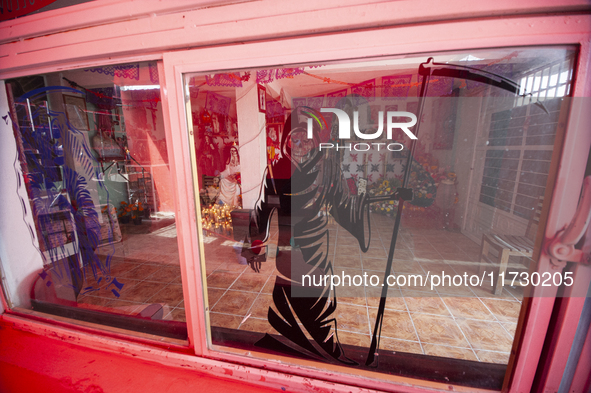 An image of Santa Muerte is seen inside the temple in the municipality of Pedro Escobedo during the annual celebrations. Every year on Novem...